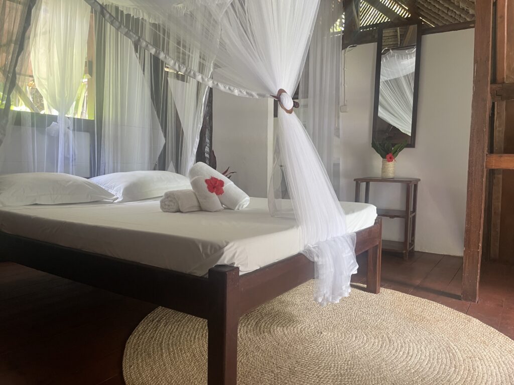 The bedroom at the Family Bungalow at Aurora Lodge