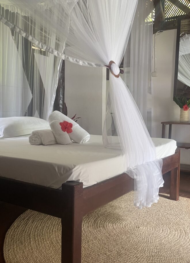 The bedroom at the Family Bungalow at Aurora Lodge